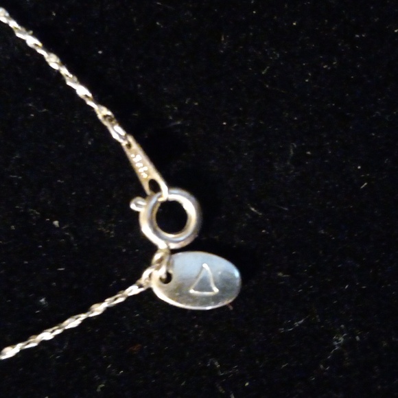 A 14 inch choker necklace with a crystal encrusted tringle. - Picture 3 of 3